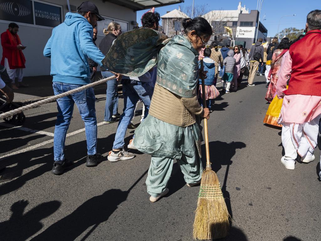 The street in front of the chariot is swept clean during Toowoomba's Festival of Chariots, Saturday, July 20, 2024. Picture: Kevin Farmer