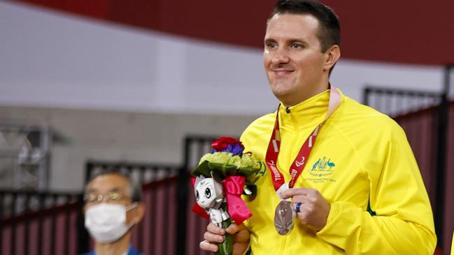 Rockhampton’s Joel Coughlan on the dais after winning silver in the at the Paralympic Games in Tokyo. (Photo by Tasos Katopodis/Getty Images)