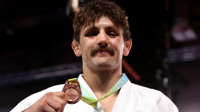 COVENTRY, ENGLAND – AUGUST 02: Bronze Medallist Jake Bensted of Team Australia celebrates during Men's Judo -73kg Medal Ceremony on day five of the Birmingham 2022 Commonwealth Games at Coventry Stadium on August 02, 2022 on the Coventry, England. (Photo by Mark Kolbe/Getty Images)