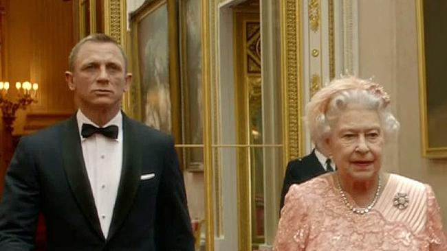 Daniel Craig playing James Bond escorting Queen Elizabeth II through the corridors of Buckingham Palace for a scene played during the Opening Ceremony of the London 2012 Olympic Games. Picture: LOCOG / AFP