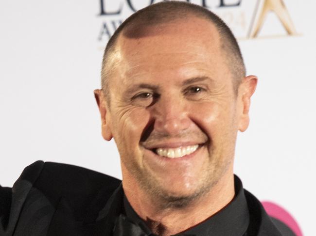 SYDNEY, AUSTRALIA - NewsWirePhotos -Sunday, 18 August 2024:LOGIE AWARDSLarry Emdur poses for a photograph after winning the Gold Logie at the 64th Television Week Logie Awards presentation ceremony at The Star in Sydney.Picture:NewsWire/ Monique Harmer