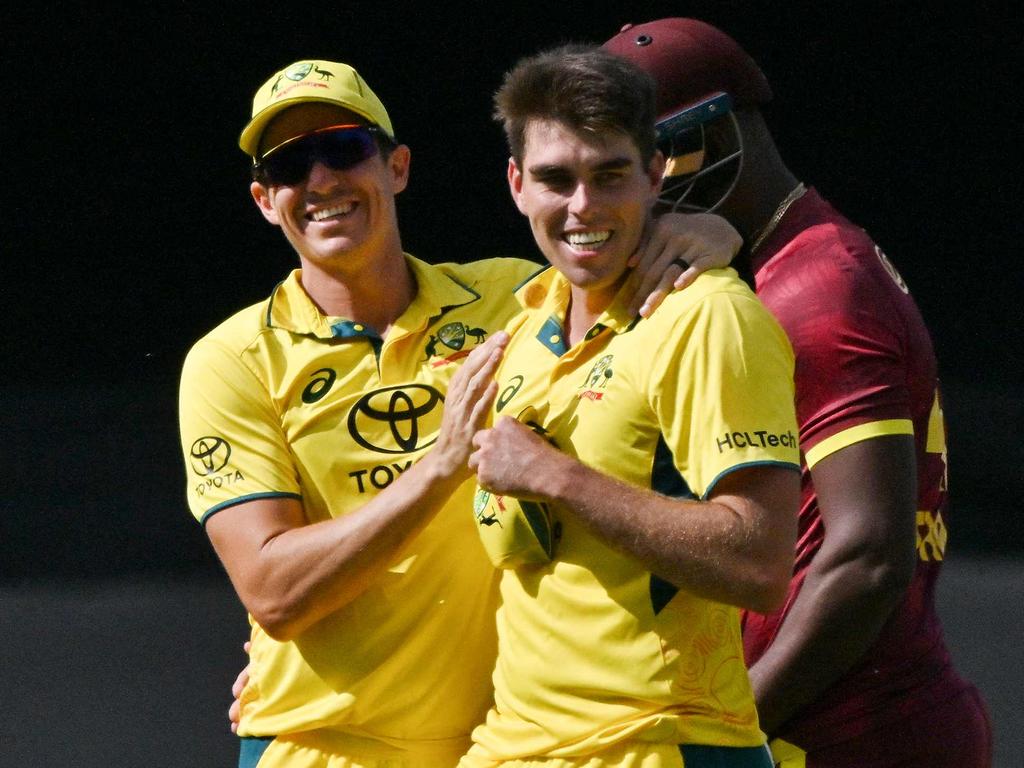 Xavier Bartlett celebrates a wicket with Sean Abbott.