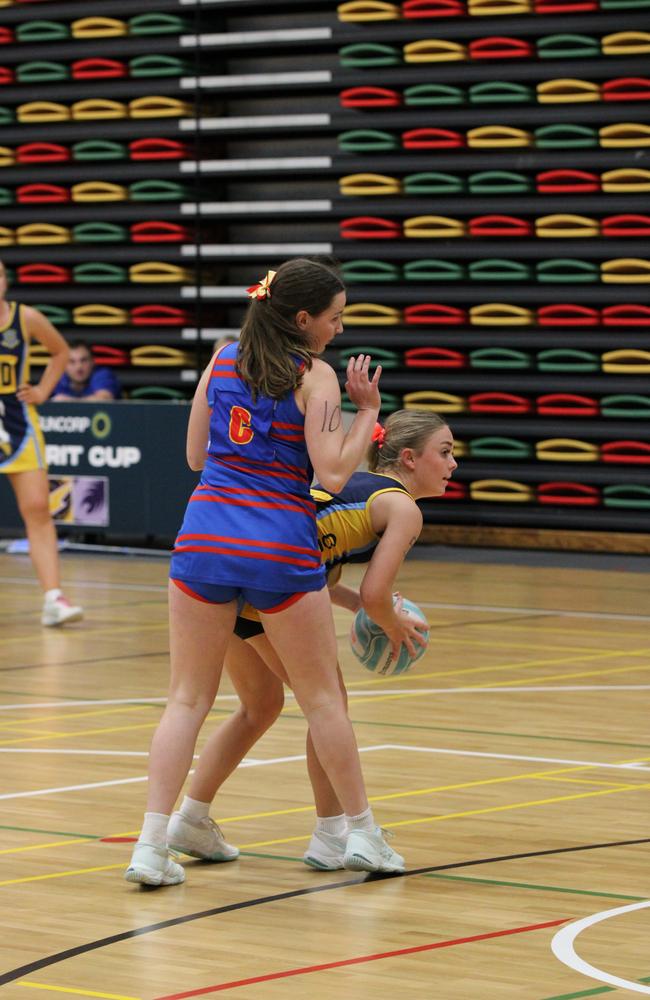 Netball action at QISSN 2024 held in Townsville. St Columbans College v Downlands College