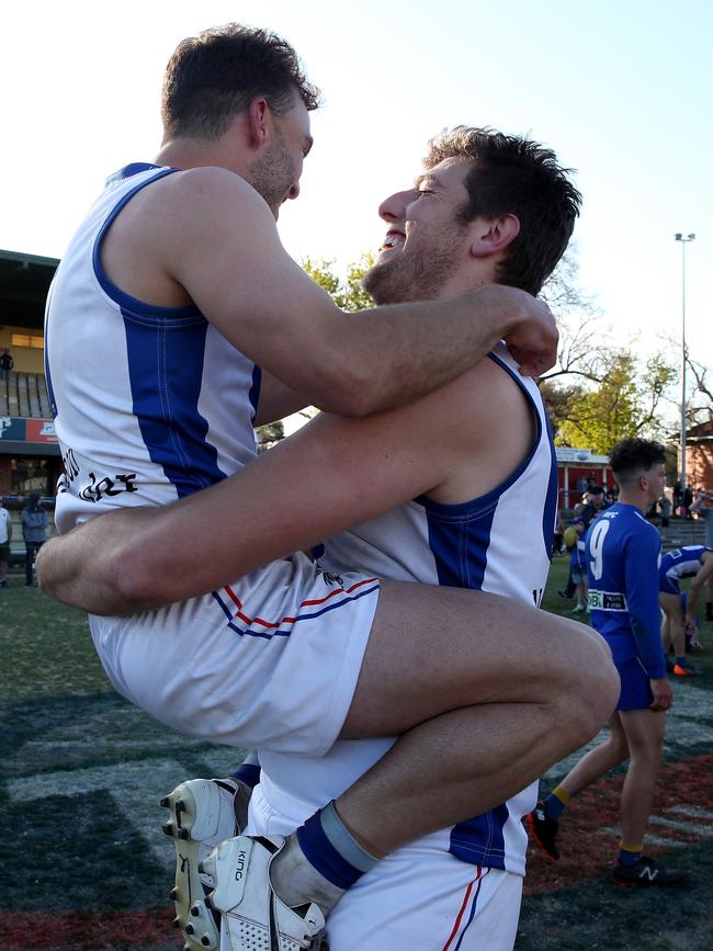 Matthew Vincitorio and Mark Kovacevic celebrate West Preston-Lakeside’s grand final triumph. 