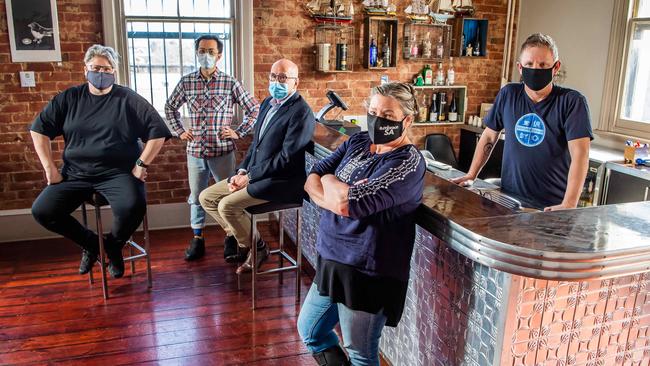 Nicolle Hahn (Cafe owner Pony and Cole), Ibrahim Yu (Cafe owner Leisurely Coffee), Ian Horne (CEO of the AHA), Simone Douglas (Publican at the Duke of Brunswick Hotel) and Jason Makarenko (Owner of La Sing karaoke bar), are fighting against Covid restrictions on hospitality. Pictured at the Duke of Brunswick Hotel in Adelaide. Picture: Tom Huntley.