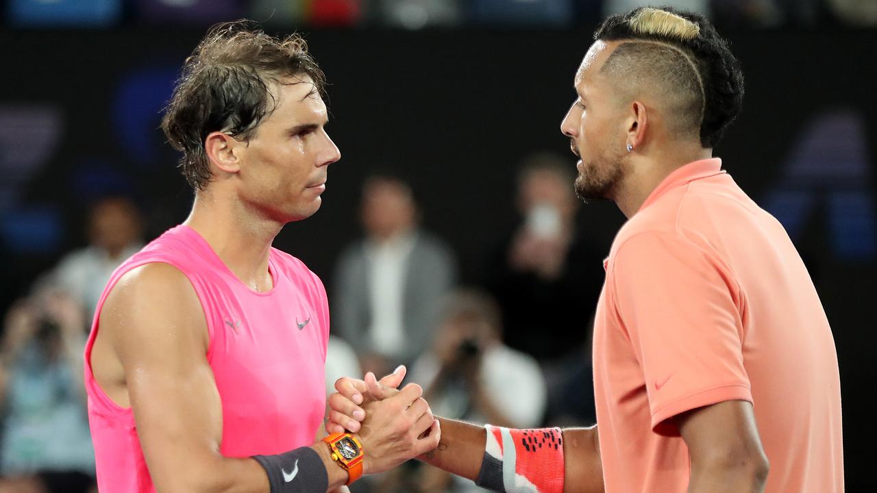 MELBOURNE, AUSTRALIA - JANUARY 27: Nick Kyrgios of Australia (R) shakes hands with Rafael Nadal of Spain at the net following their Men's Singles fourth round match on day eight of the 2020 Australian Open at Melbourne Park on January 27, 2020 in Melbourne, Australia. (Photo by Jonathan DiMaggio/Getty Images)