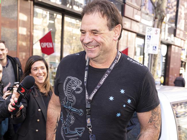 CFMEU Secretary John Setka (right) leaves at the ACTU building in Melbourne, Thursday, June 13, 2019. (AAP Image/Daniel Pockett) NO ARCHIVING