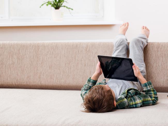 A child using an ipad.