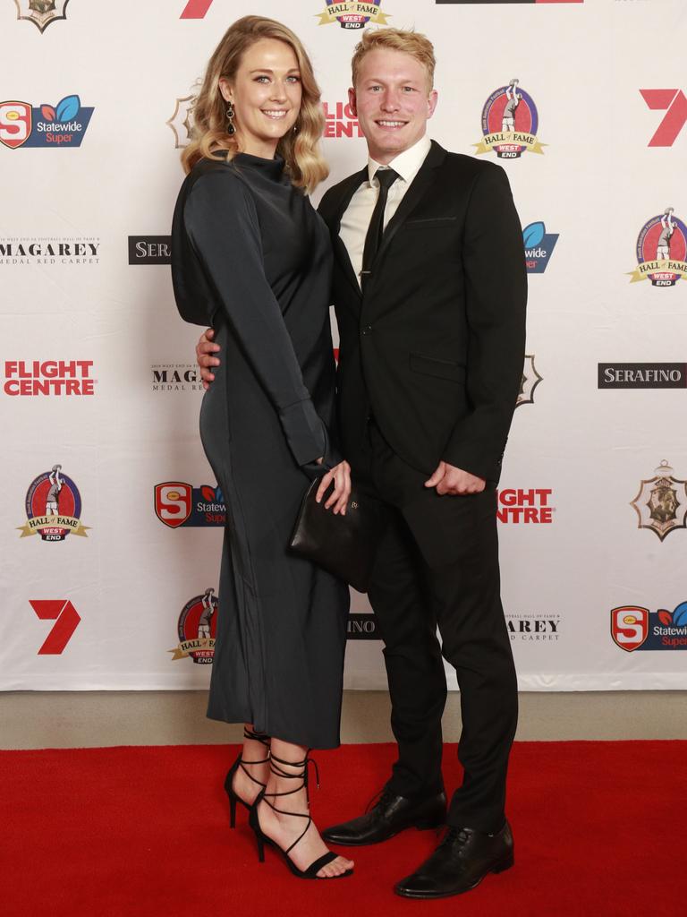 Bre Fay and Travis Schiller pose for a picture on the red carpet at Adelaide Oval in North Adelaide, for the Magarey Medal, Monday, September 9, 2019. Picture: Matt Loxton