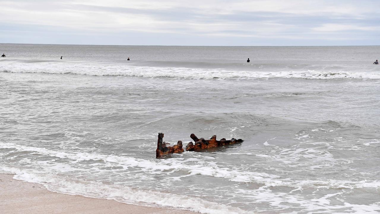 Cyclone Alfred has eroded the sands at Dicky Beach to reveal the remanence of the vessel SS Dicky. Picture: Patrick Woods.