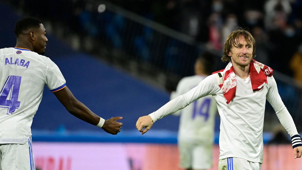 Real Madrid's Croatian midfielder Luka Modric (R) tested positive for Covid-19.