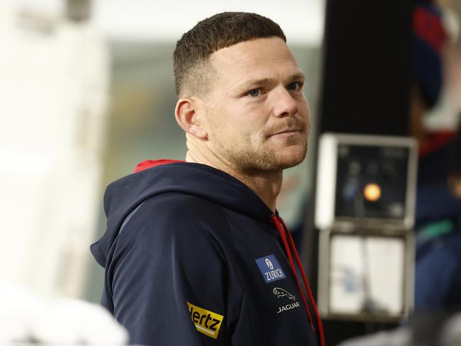 MELBOURNE, AUSTRALIA - MAY 28: Steven May of the Demons is seen on the interchange bench during the round 11 AFL match between the the Melbourne Demons and the Fremantle Dockers at Melbourne Cricket Ground on May 28, 2022 in Melbourne, Australia. (Photo by Darrian Traynor/Getty Images)