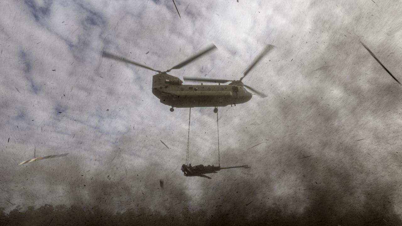 An Army CH-47 Chinook with an underslung M777 Howitzer from 4th Regiment, Royal Australian Artillery, during Exercise Talisman Sabre 2023 at Shoalwater Bay Training Area, Queensland.