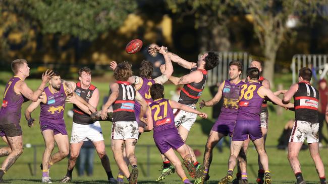 Plenty of numbers around the footy between Collegians and Old Xaverians at Harry Trot Oval.Picture: Stuart Milligan