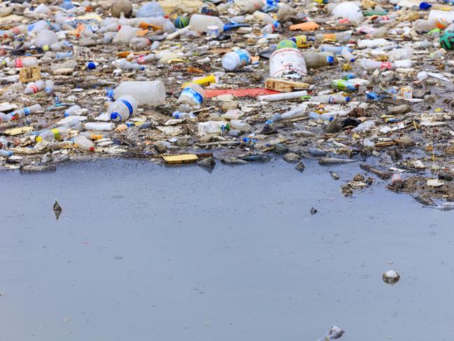 Istanbul, Turkey - May 27, 2018: Water Pollution - Polluting the Seas. Plastic waste floating in a canal in Istanbul, Turkey. Istock