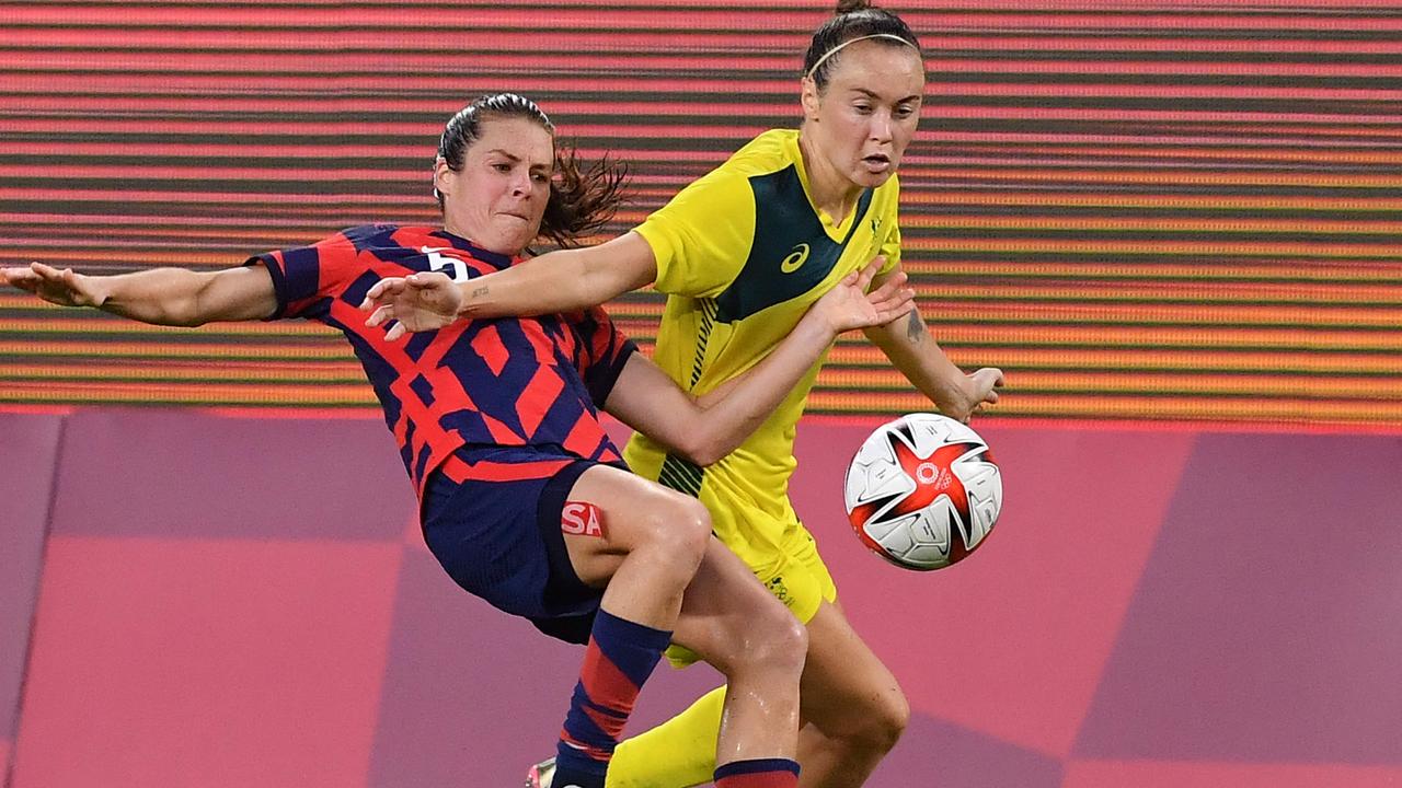 Caitlin Foord gets the better of USA defender Kelley O'Hara.