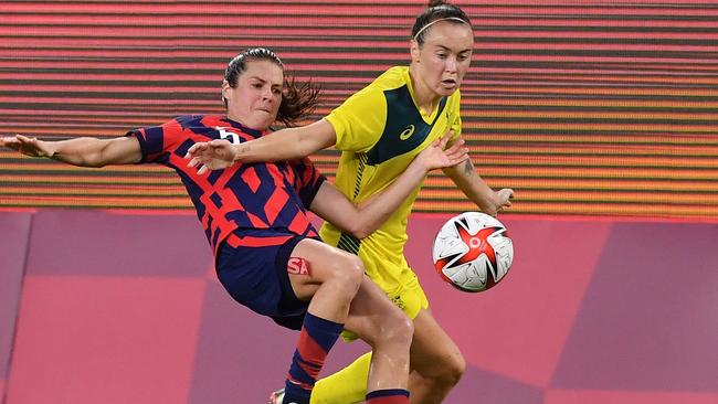 Caitlin Foord gets the better of USA defender Kelley O'Hara.