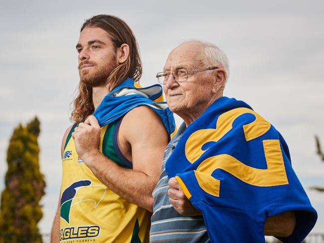 Fourth-generation Eagle, Jordan Foote poses for a picture with his grandfather John Foote in Woodville South, after he has signed with the Eagles Football Club after being delisted by the Sydney Swans, Tuesday, Dec. 18, 2018. Picture: MATT LOXTON