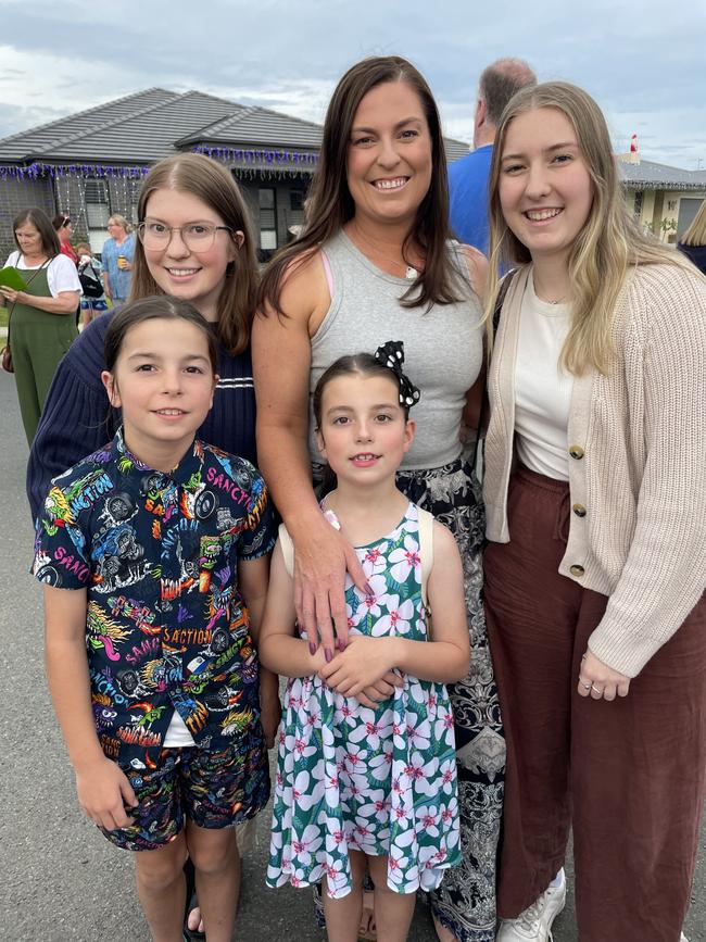 Kim McArthur pictured with her four daughters Ellie, Jasmin, Cleo and Annabelle.