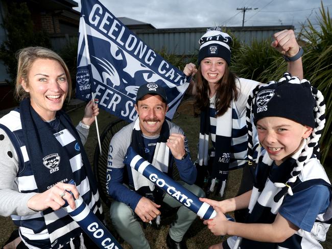 Geelong Fans Brad and Ebony Cole with Danika, 13, and Finn, 8, happy that they will be able to attend the match on the weekend. Picture: Mike Dugdale