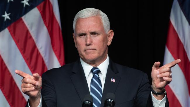 (FILES) In this file photo taken on August 9, 2018 US Vice President Mike Pence speaks about the creation of a new branch of the military, Space Force, at the Pentagon in Washington, DC. - A spokesman for Mike Pence on September 6, 2018 denied the US vice president might be the official who wrote a scathing, unsigned op-ed piece in the New York Times about President Donald Trump. On the internet, the focus on Pence as the possible author apparently stemmed from the use of the obscure word 'lodestar' in the column. Pence is said to have used that term in several speeches in the past.But Pence spokesman Jarrod Agen insisted the vice president did not write the piece, which said Trump's own staff sees him as a danger to the nation who needs to be protected from his own erratic impulses. (Photo by SAUL LOEB / AFP)