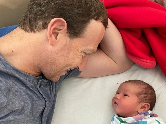 Mark Zuckerberg with his third child in 2023.