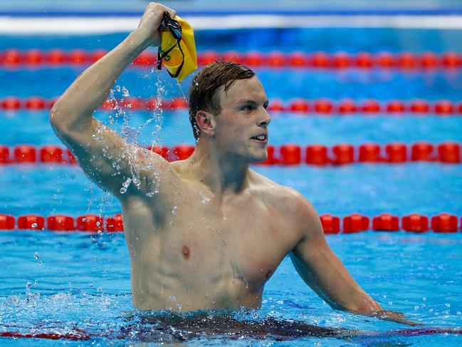 RIO DE JANEIRO, BRAZIL - AUGUST 10: Kyle Chalmers of Australia celebrates winning gold in the Men's 100m Freestyle Final on Day 5 of the Rio 2016 Olympic Games at the Olympic Aquatics Stadium on August 10, 2016 in Rio de Janeiro, Brazil. (Photo by Clive Rose/Getty Images)