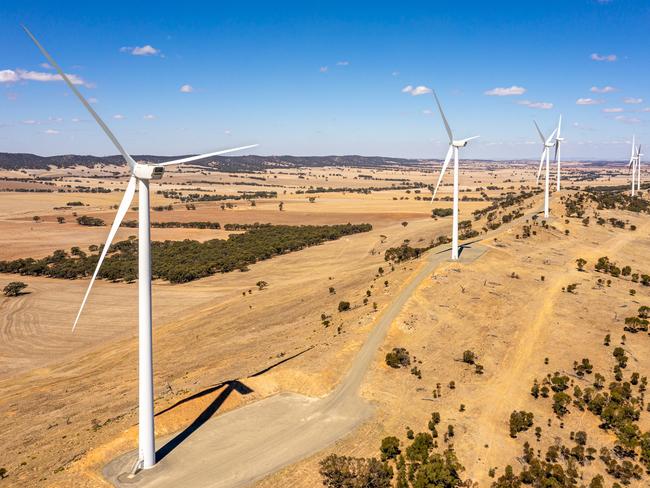 Wind Farm with blue sky in an open paddock. Australian generic