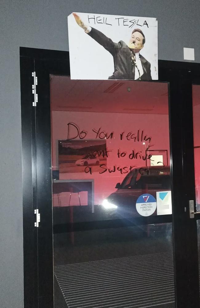 Anti-Elon Musk graffiti at the Tesla Hobart dealership. Picture: Supplied