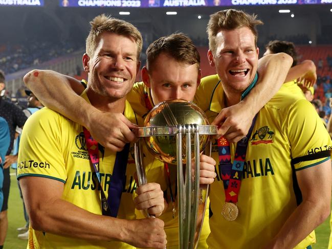 David Warner, Marnus Labuschagne and Steve Smith pose with the ICC Men's Cricket World Cup Trophy in 2023. Picture: Getty Images