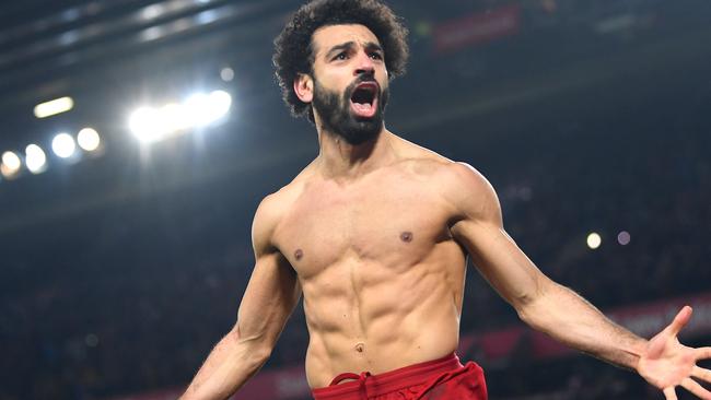 Mo Salah ripped off his shirt after scoring the goal to clinch Liverpool’s win over Manchester United. Picture: Michael Regan/Getty Images