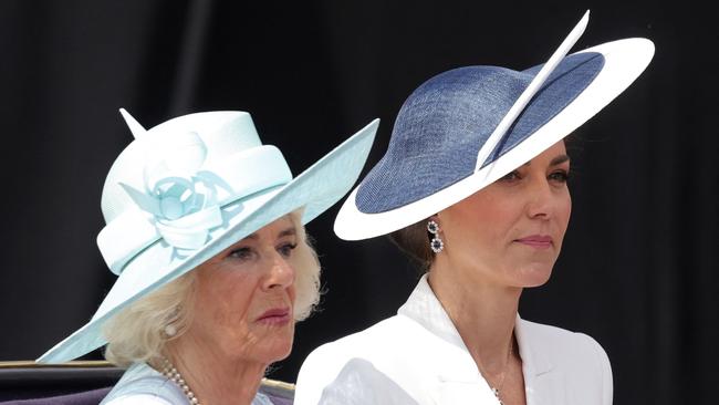 Britain's Camilla, Duchess of Cornwall and Kate Middleton, Duchess of Cambridge, travel in a horse-drawn carriage during the Queen's Birthday Parade. Picture: AFP