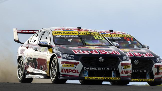 Jamie Whincup refuses to yield to teammate Shane van Gisbergen despite team orders in a heated duel. Picture: Getty Images