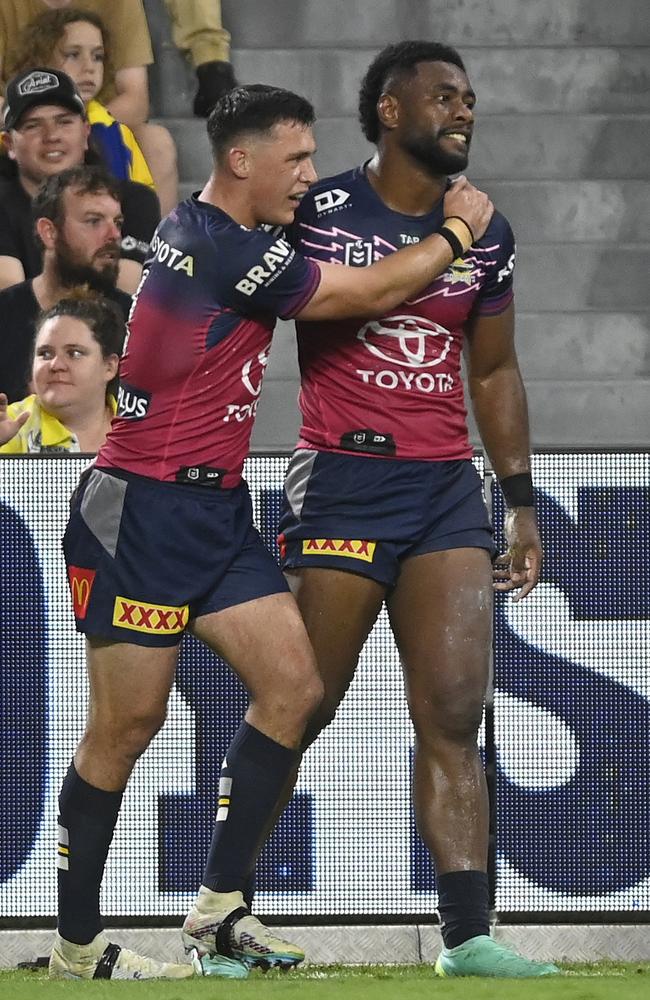 Semi Valemei celebrates with Scott Drinkwater after scoring a try. (Photo by Ian Hitchcock/Getty Images)