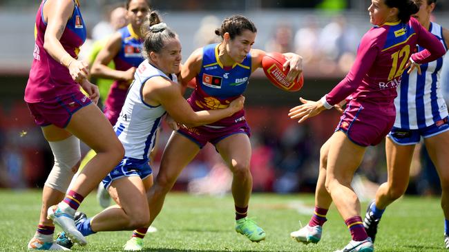 MELBOURNE, AUSTRALIA - DECEMBER 03: Ally Anderson of the Lions is tackled by Emma Kearney of the Kangaroos during the AFLW Grand Final match between North Melbourne Tasmania Kangaroos and Brisbane Lions at Ikon Park, on December 03, 2023, in Melbourne, Australia. (Photo by Josh Chadwick/AFL Photos/via Getty Images)