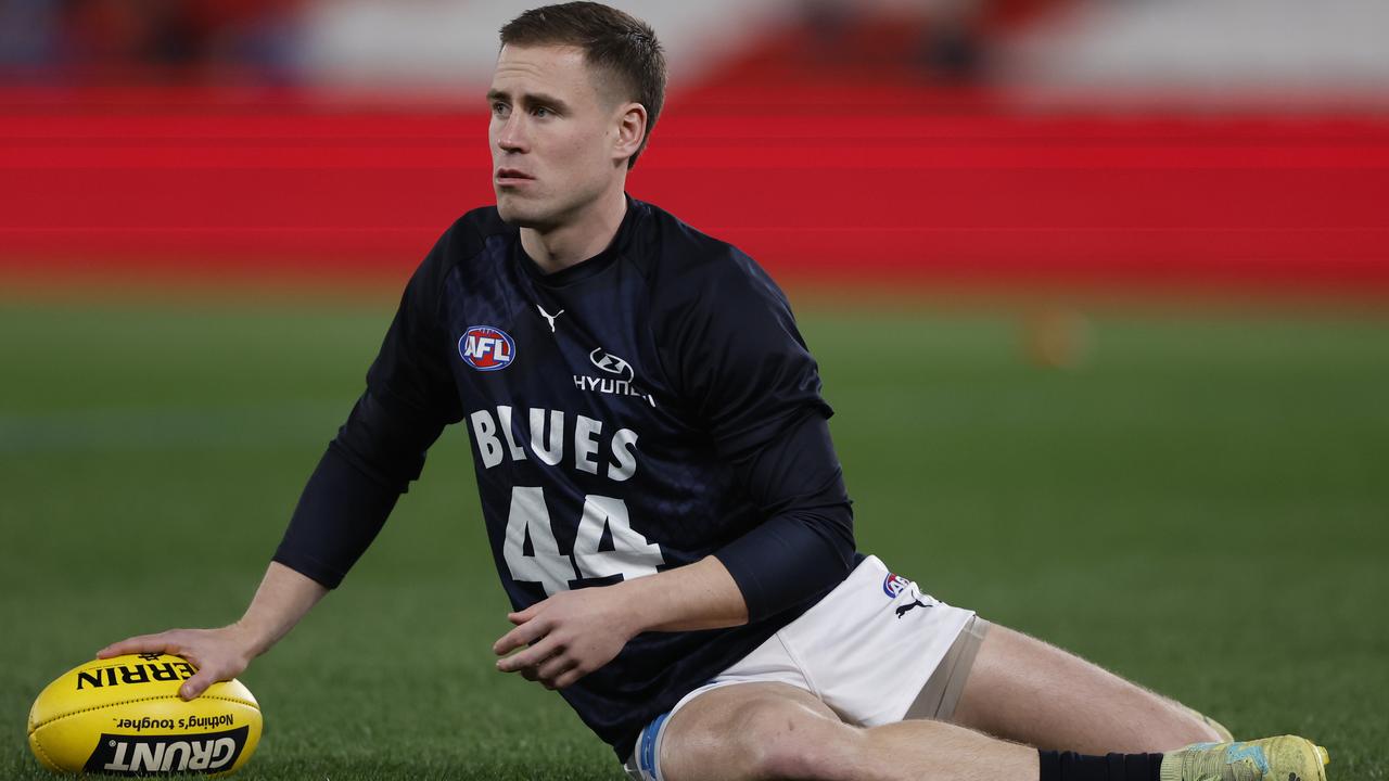 MELBOURNE, AUSTRALIA - JULY 13: Matthew Owies of the Blues warms up before the round 18 AFL match between Western Bulldogs and Carlton Blues at Marvel Stadium, on July 13, 2024, in Melbourne, Australia. (Photo by Darrian Traynor/AFL Photos/via Getty Images)