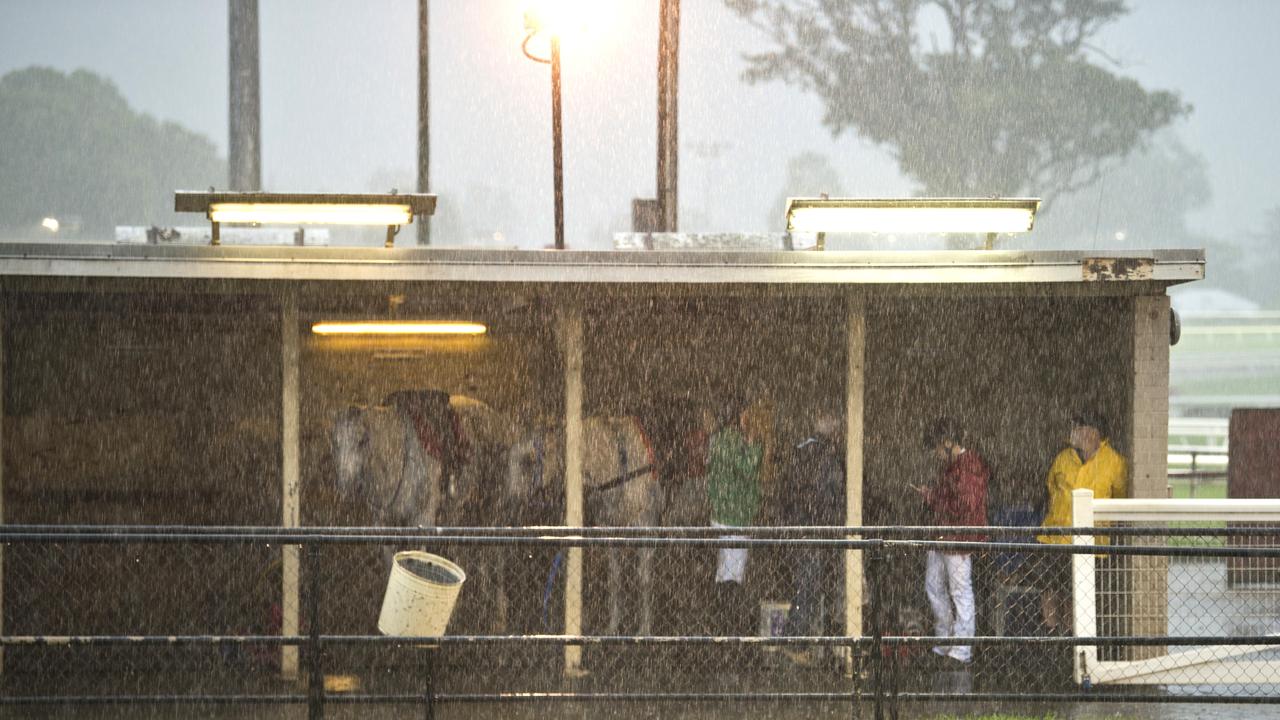 The rain tumbles down at Clifford Park late this afternoon. Picture: Nev Madsen.