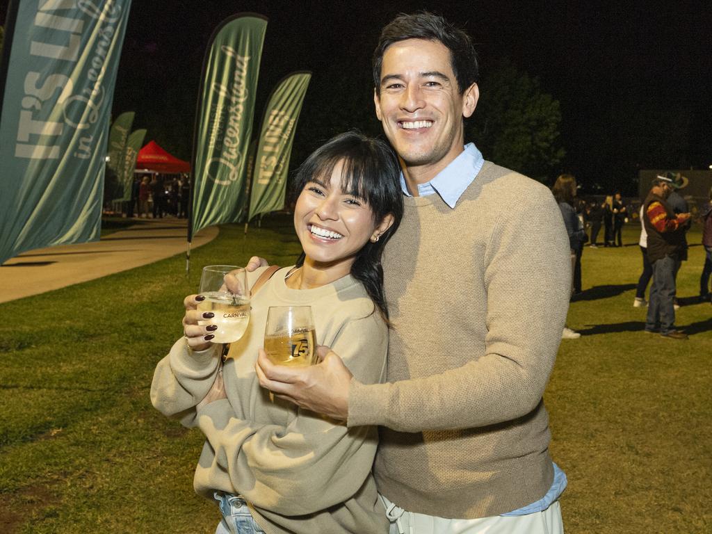 Alicia Nadine and Jamie Choo at the Symphony Under the Stars concert performed by the Queensland Symphony Orchestra in Queens Park Amphitheatre for Carnival of Flowers, Friday, October 4, 2024. Picture: Kevin Farmer