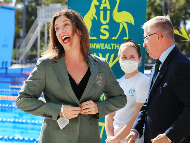 Wells being presented with an Australian Commonwealth Games team blazer in 2022.