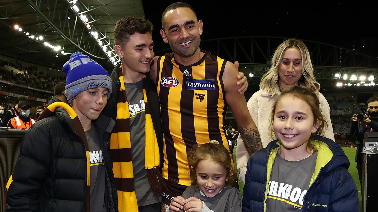 Burgoyne walks down the race with his family after playing his 400th game. Picture: Michael Klein