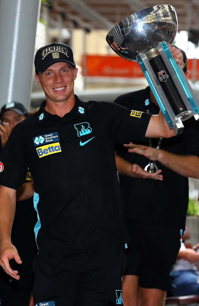 Nathan McSweeney lifts the BBL trophy in Queen St Mall. Picture: David Clark