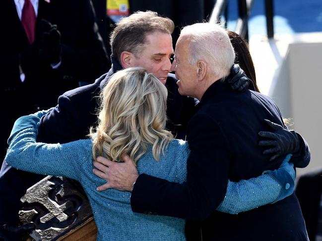 US President Joe Biden hugs his son Hunter Biden and US First Lady Jill Biden after being sworn in as the 46th US President in January. Picture: Olivier Douliery/AFP