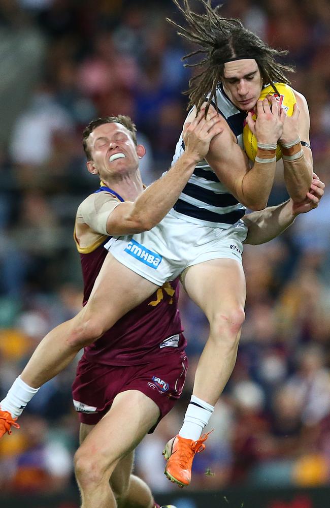 Gryan Miers flies for a mark during Saturday’s preliminary final against Brisbane. Picture: Jono Searle/AFL Photos/via Getty Images