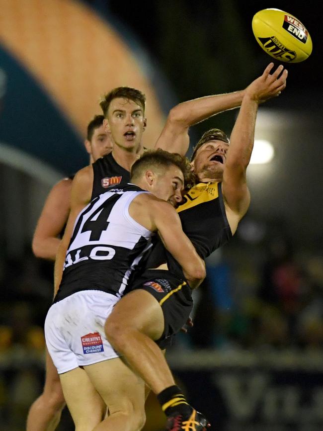 Glenelg's Ben Sawford attempts to mark the ball. Picture: Naomi Jellicoe