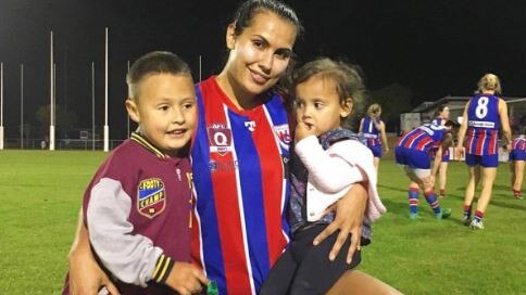 MacNeill won a QWAFL premiership with Wilston Grange last year, much to the delight of her children Chance and Charli.