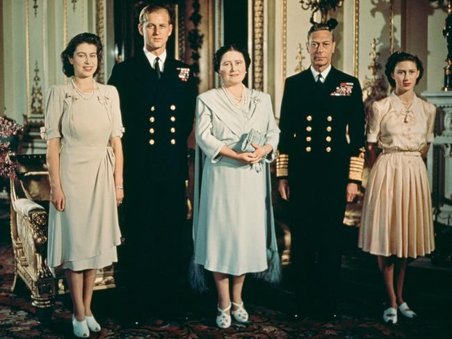 Princess Elizabeth poses with her husband-to-be, parents and sister in the state apartments at Buckingham Palace for an official photo to mark her engagement in July 1947. Their marriage in November that year marked the start of a long partnership in which Philip steadfastly supported his wife at thousands of events at home and abroad. Picture: Getty