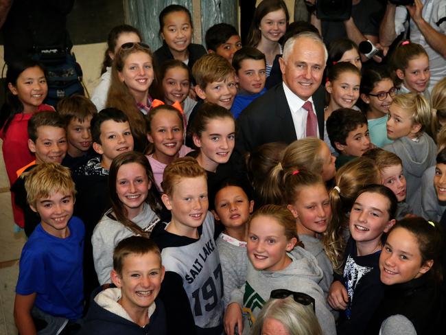 Prime Minister Malcolm Turnbull mobbed by schoolchildren at Parliament House in Canberra / Picture: Mick Tsikas