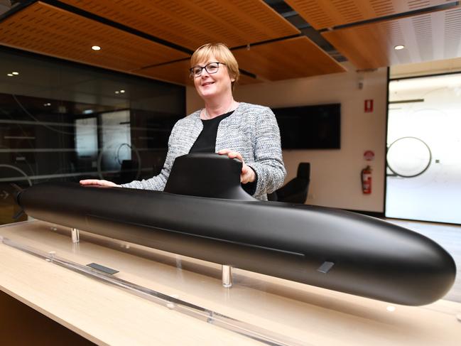 Defence Minister Linda Reynolds poses next to a model of the Barracuda-class submarine during a visit to Naval Group in Adelaide in February this year. Picture: AAP/David Mariuz