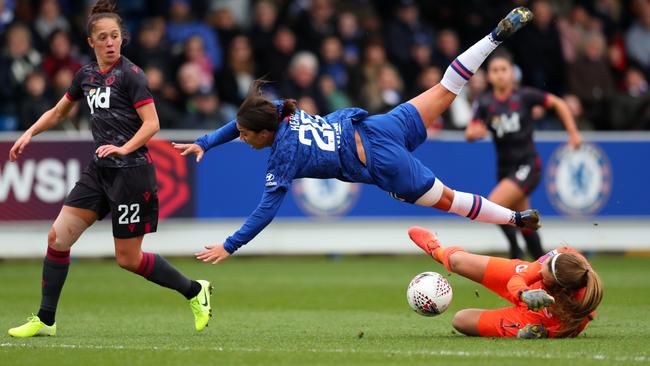 Australia’s Sam Kerr is cut down by the Reading keeper in her debut for Chelsea