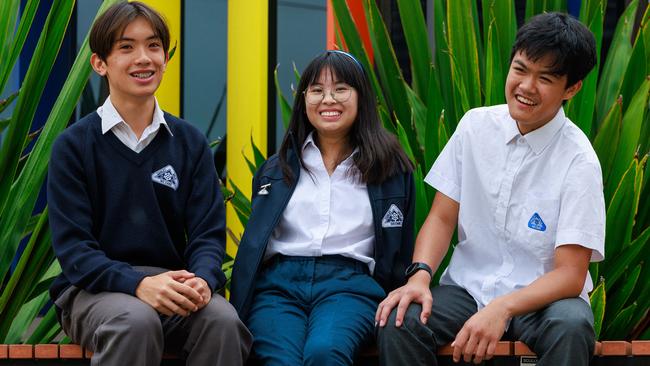 Bryton Lam, 14, Jessica Ly, 14, and Khaly Khun, 14, at Canley Vale High School. Picture: Justin Lloyd.